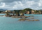 one of the smaller islands (in the middle ground - it has moss) : 2013 Holidays, Bay_of_Islands, Coastline, Holidays, Mountians Rivers and waterways, New Zealand, Places, Seas and Oceans, World Cruise 2013, rocks, sea