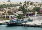 there is enough space between ships in transit for the ferris to dash across the canal with cars, lorries and passengers : 2013 Holidays, Boats and ships, Canals, Coastline, Egypt, Holidays, Mountians Rivers and waterways, Places, Suez, Suez Canal, Transport, World Cruise 2013
